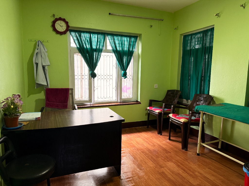 Doctor consultation cabin with clinical examination bed and desk