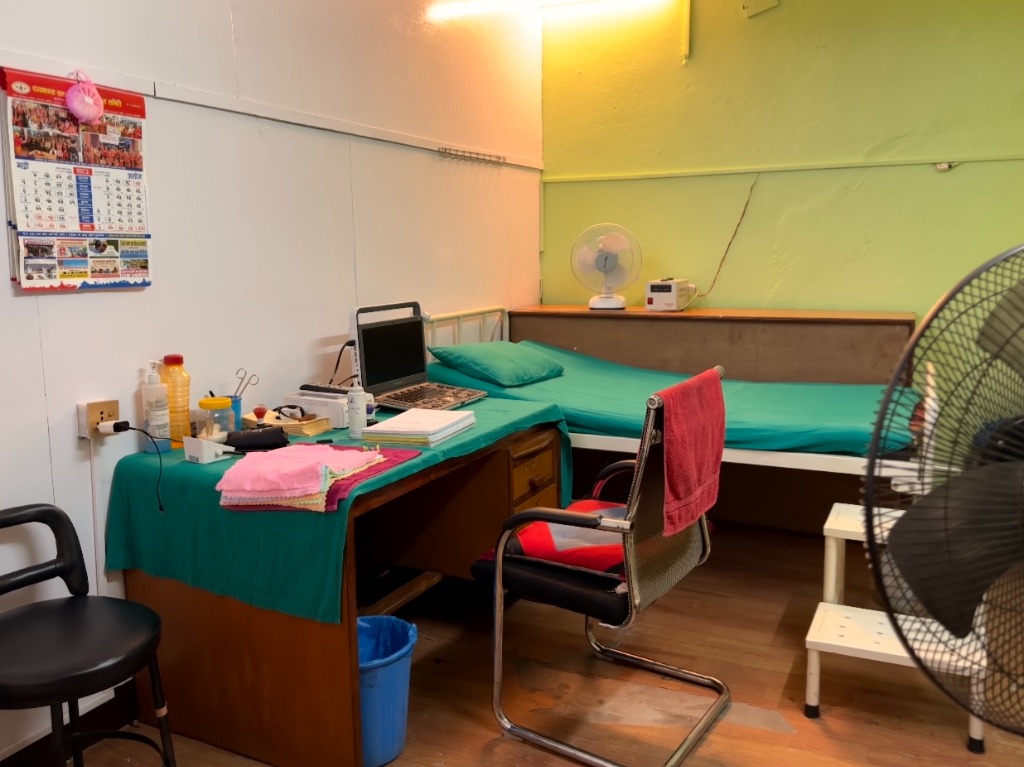 Ultrasound screening station and clinical desk at Khushi Clinic